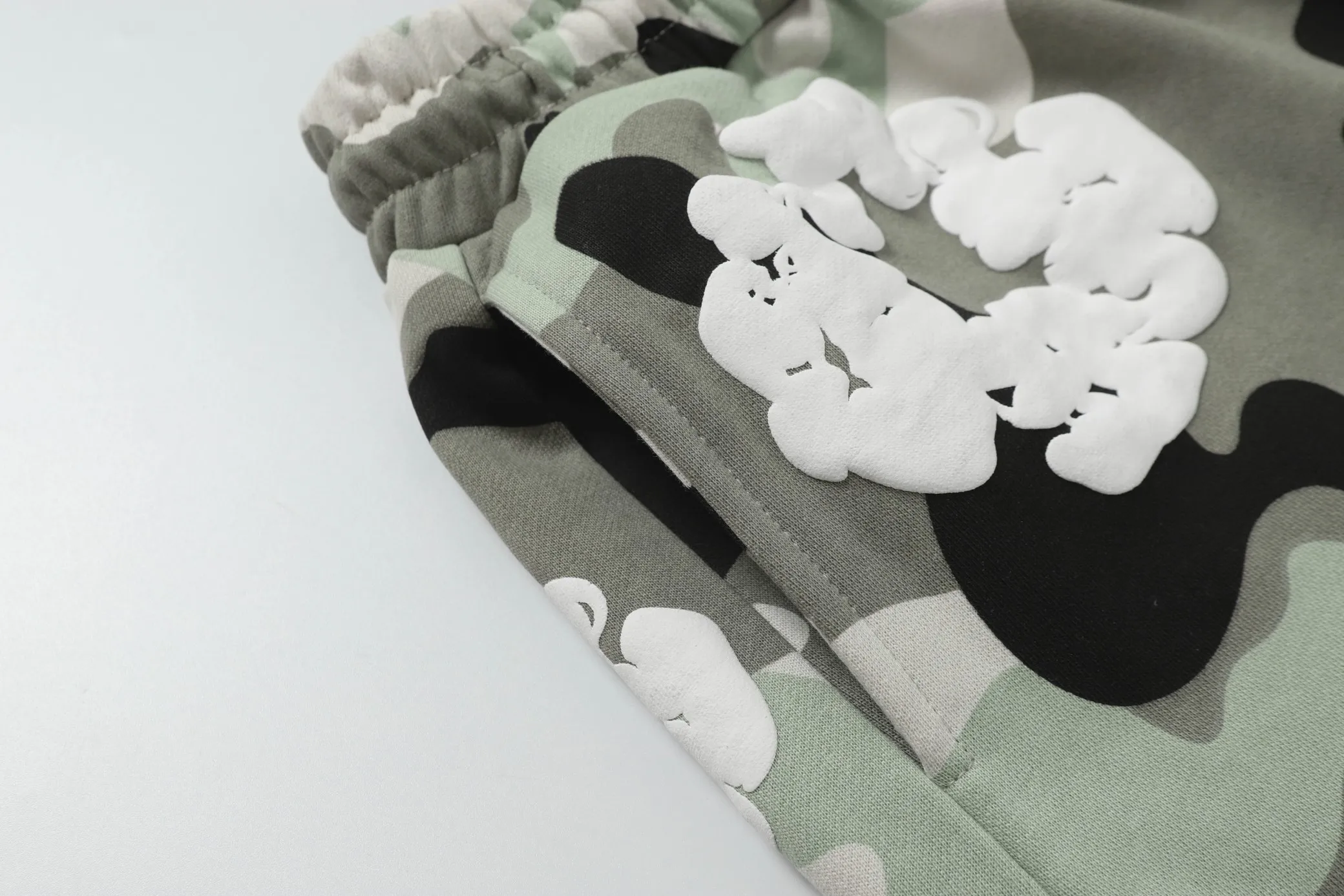 8208# DENIM TEARS Kapok European and American trendy brand high-quality foam flocking camouflage printed shorts Color Camouflage blue Camouflage powder Camouflage gray Camouflage apricot Camouflage green Size S-XL